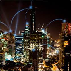 Singapore building at night with light connections